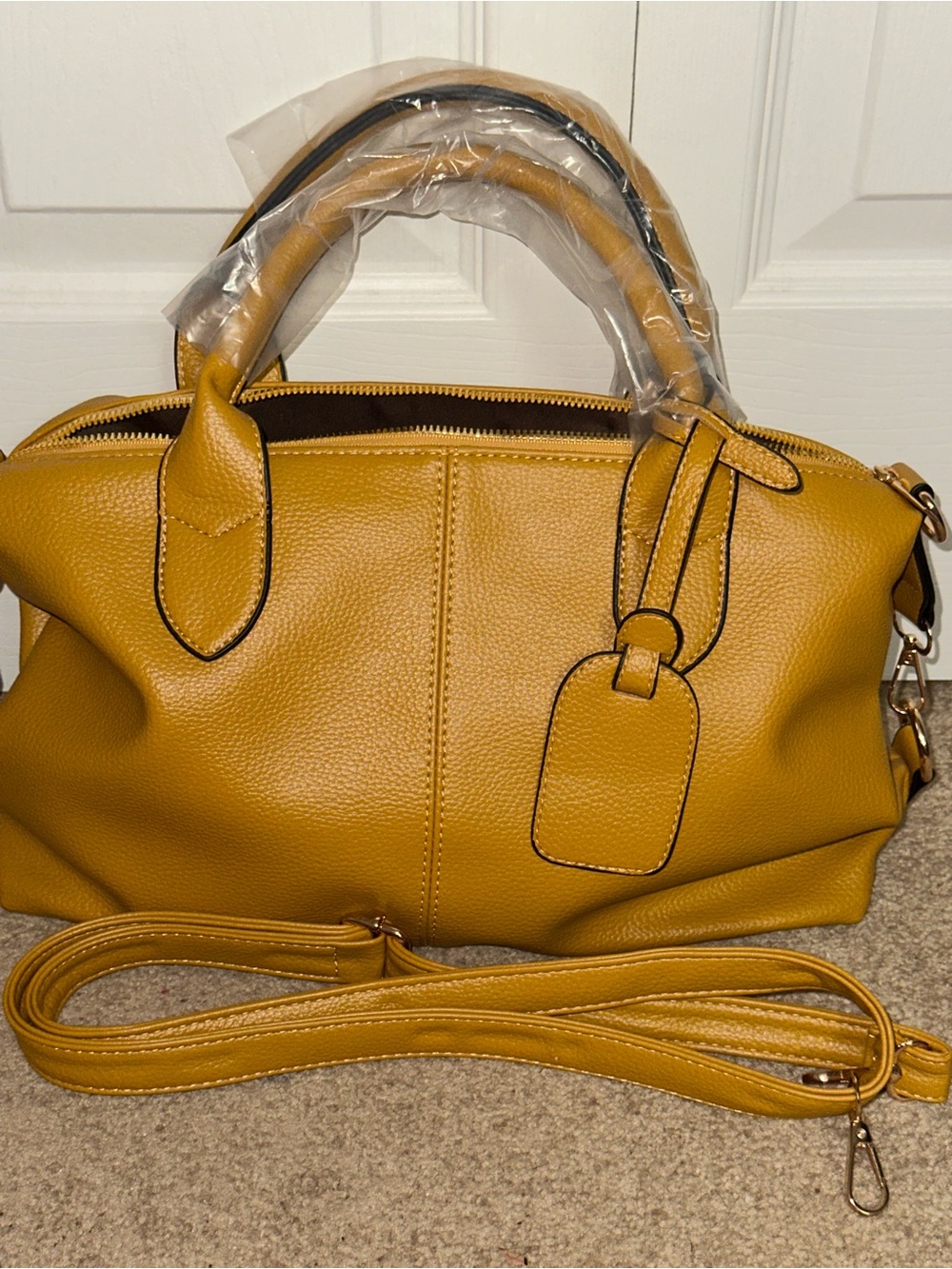Mustard yellow slouchy faux leather handbag with shoulder strap